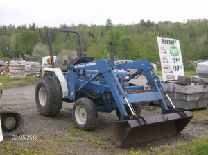 Tractor, shown with attachments.